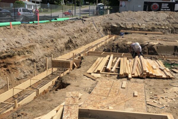 worker working on putting in framing for a commercial building - J.R. Construction LTD - midland on