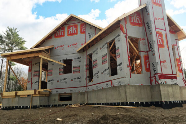 foundation and framing of a custom home shape with deck - J.R. Construction LTD - midland on