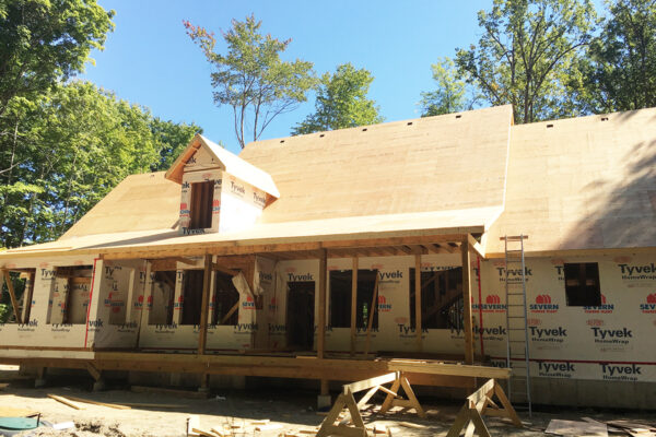 wooden custom framing for a residential home with a large deck - J.R. Construction LTD - midland on