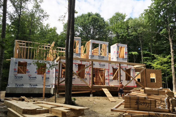 in progress photo of custom framing being done for the second floor of a residential home - J.R. Construction LTD - midland on