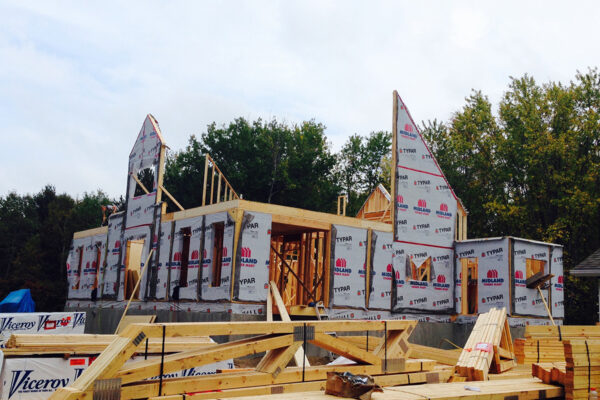 in-progress photo of house framing being added to the second floor - J.R. Construction LTD - midland on