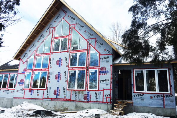 framing and foundation of a house with large beautiful windows - J.R. Construction LTD - midland on